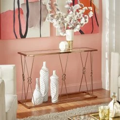 Hot Sale ✨ Sandiacre Champagne Gold Reef Knot Frame And Glass Sofa Table By INSPIRE Q Bold 🥰